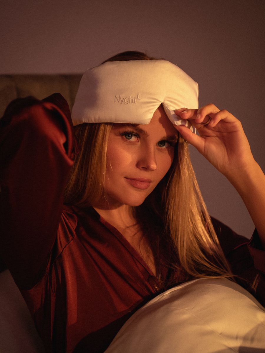 Nyght sleep shoot, woman with an eye mask in bed